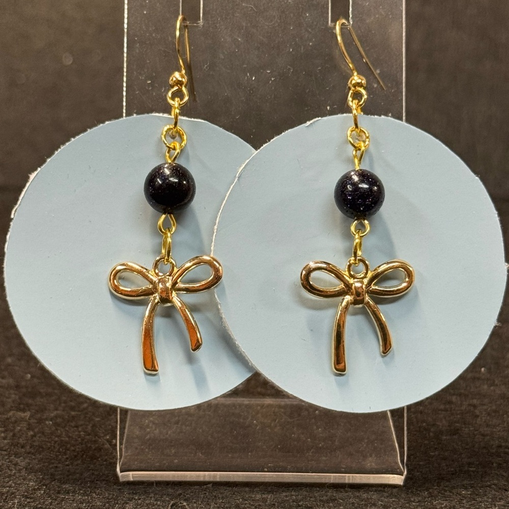 Blue Faux Leather And Gold Bow Dangle Earrings